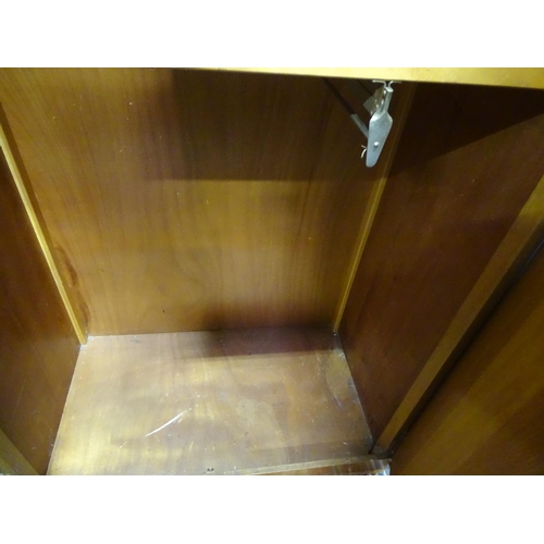 129 - E. Gomme, light oak wardrobe (2 door)