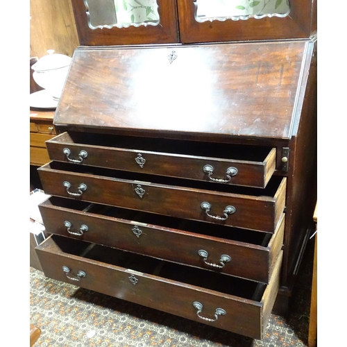 146 - A large Victorian bureau bookcase