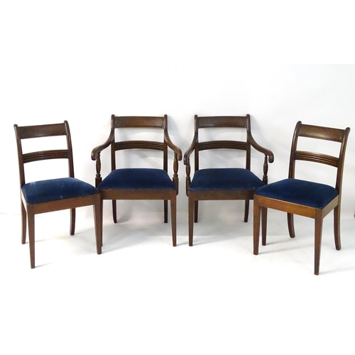 15 - A set of four 19thC mahogany dining chairs with curved top rail, chamfered mid rail and scrolled arm... 