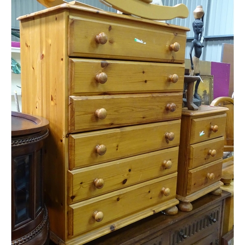 151 - A pine chest of drawers together with matching bedside cabinet (2)