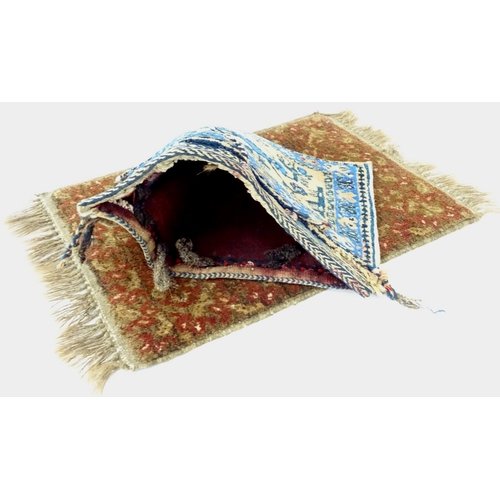 172 - A small Turkish handmade doormat, together with a small handmade Turkish salt bag