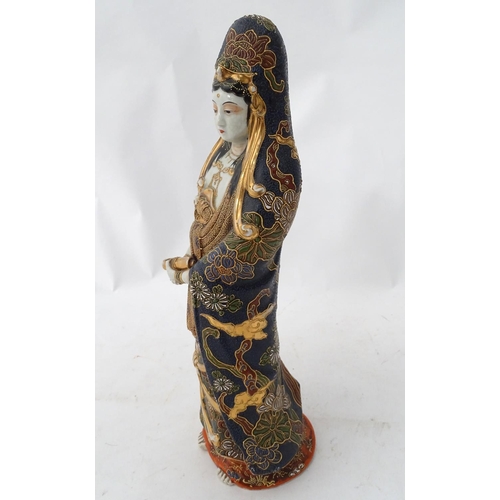 182 - A Japanese Satsuma figure of Guanyin , Bodhisattava '' Godess of Mercy '' in a standing position hol... 