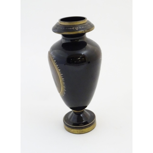 190 - A black memorial glass vase decorated with a portrait of a high ranking German officer / military ge... 