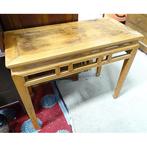 192 - An oriental side table / hall table