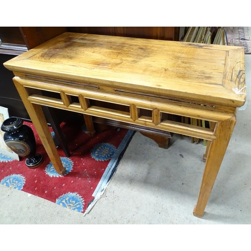 192 - An oriental side table / hall table