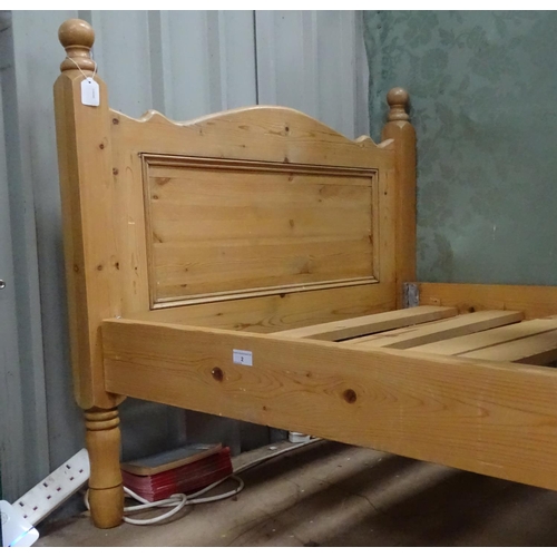 2 - A stripped pine single bed