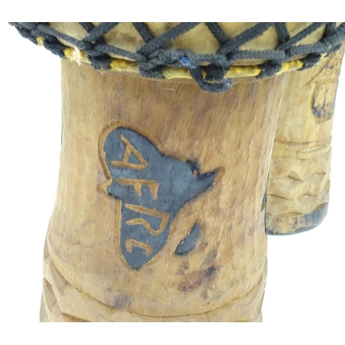 210 - A pair of African bongo drums