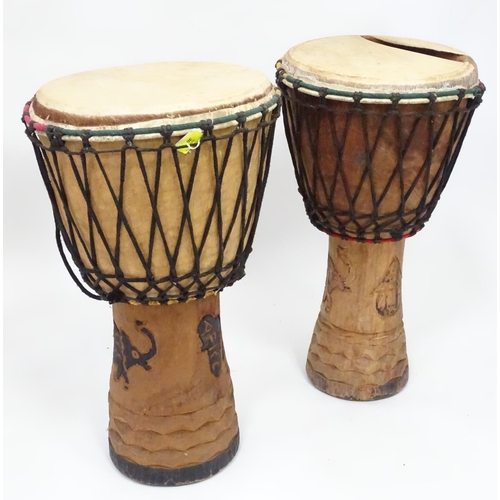 210 - A pair of African bongo drums