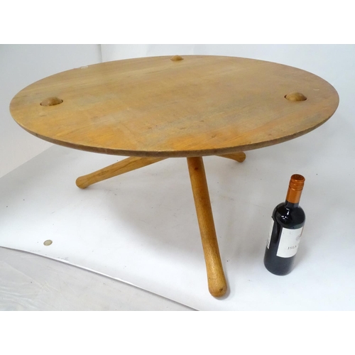 232 - A circular tripod table