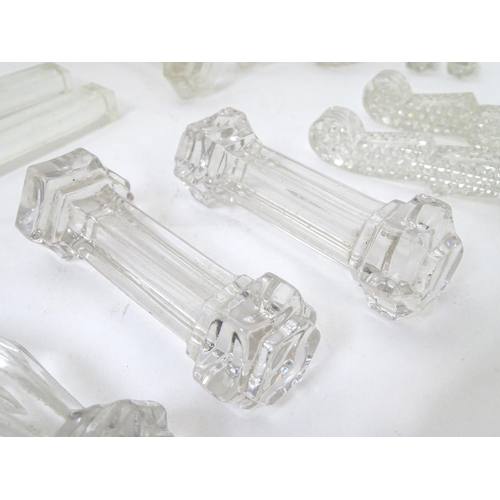 239 - Knife / Spoon rests : 14 assorted shaped glass rests , the largest measuring 4 1/4'' wide .