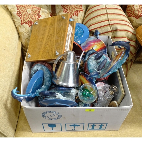 241 - A box of misc. to include glassware, a flower press, dolphin ornaments, etc.