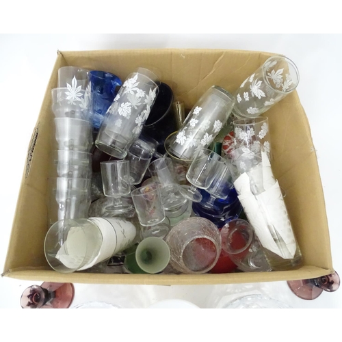 26 - A quantity of assorted glass to include vases, bowls, drinking glasses etc.