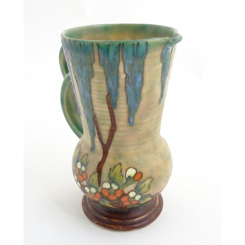 295 - An Art Deco Crown Devon Fieldings 'Mattita' double handled vase / jug with tube lined and drip glaze... 