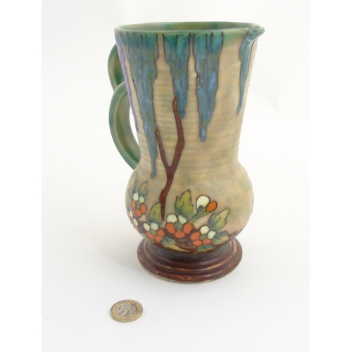 295 - An Art Deco Crown Devon Fieldings 'Mattita' double handled vase / jug with tube lined and drip glaze... 