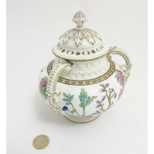 296 - A late 19thC / early 20thC lidded Coalport 3 handled pot pourri pot with cover, in ''Indian Tree '' ... 