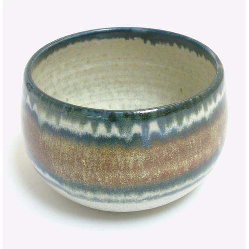 297 - Scandinavian Studio Pottery: A 1980s bowl decorated in brown, blue and cream colours, sgraffito make... 