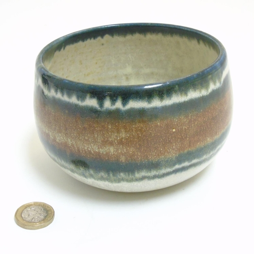 297 - Scandinavian Studio Pottery: A 1980s bowl decorated in brown, blue and cream colours, sgraffito make... 