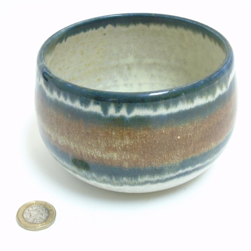 297 - Scandinavian Studio Pottery: A 1980s bowl decorated in brown, blue and cream colours, sgraffito make... 