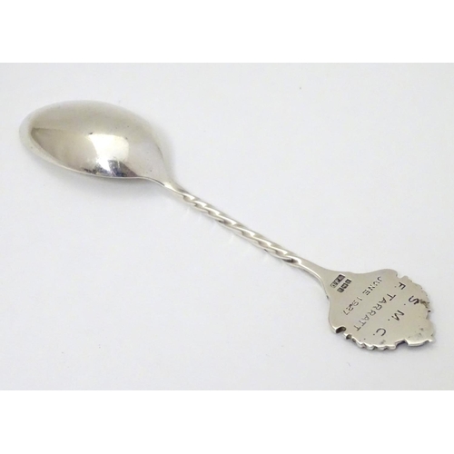 307 - A silver teaspoon with crossed rifle decoration to handle hallmarked Birmingham 1926 maker William J... 