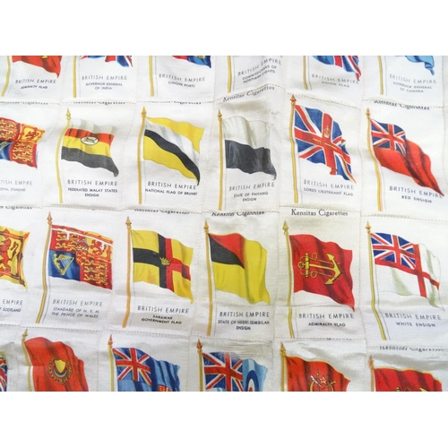 311 - A silkwork postcard depicting flags of the British Empire