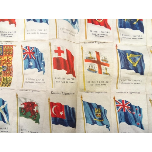 311 - A silkwork postcard depicting flags of the British Empire