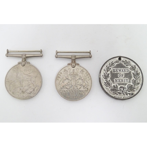 312 - Militaria : A 1939-1945 War Medal, together with Defence Medal and a 'reward of merit - awarded for ... 