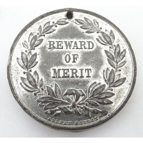 312 - Militaria : A 1939-1945 War Medal, together with Defence Medal and a 'reward of merit - awarded for ... 