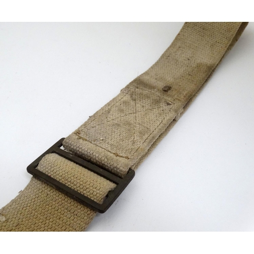 313 - Militaria : A British WWII / World War 2 webbing belt, stamped ' BUCKS CD AMB ' (Buckinghamshire Civ... 