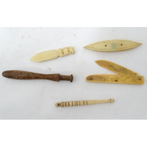 314 - A quantity of assorted items to include a bone/ivory fruit knife, bobbin, bookmark etc. and a foldin... 