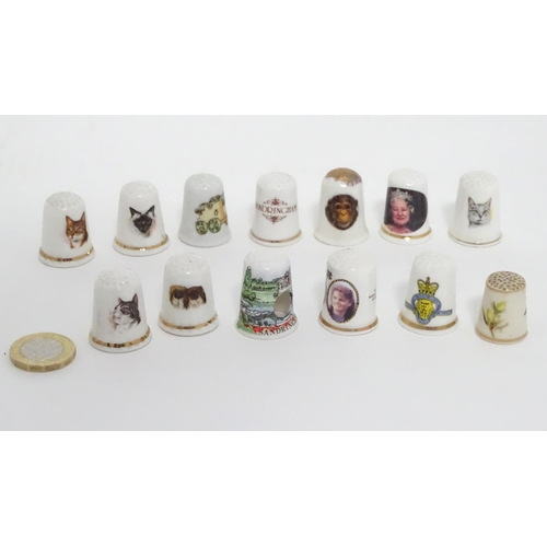 315 - An assortment of commemorative thimbles