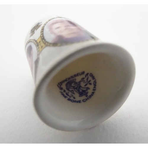 315 - An assortment of commemorative thimbles