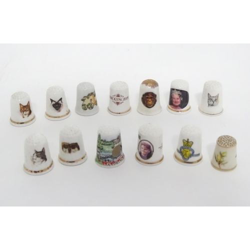 315 - An assortment of commemorative thimbles