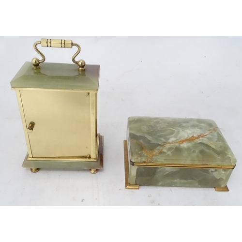 319 - An onyx cigarette box, together with a carriage clock