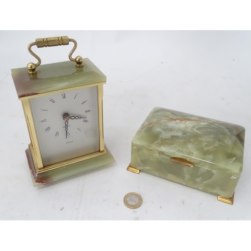 319 - An onyx cigarette box, together with a carriage clock