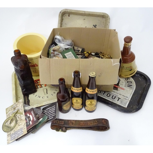 33 - A quantity of breweriana to include drinks trays, collectables, bottles etc.