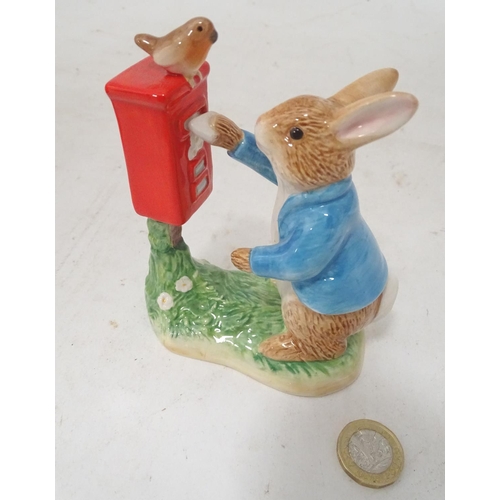 331 - A Royal Doulton figurine of Bunnykins posting a letter