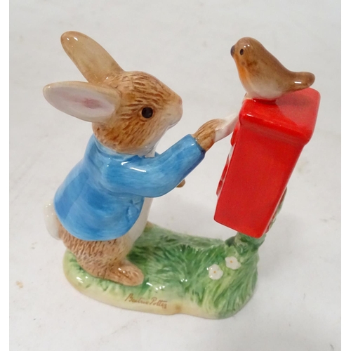 331 - A Royal Doulton figurine of Bunnykins posting a letter