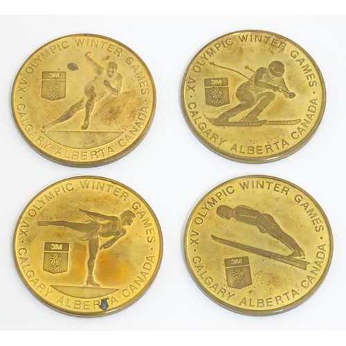 354 - Collectable coins: A boxed set of four commemorative medals, struck for the XV (1988) Olympic Winter... 