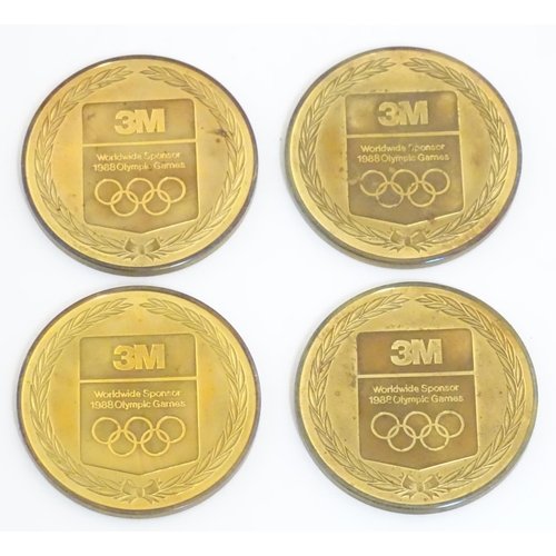 354 - Collectable coins: A boxed set of four commemorative medals, struck for the XV (1988) Olympic Winter... 