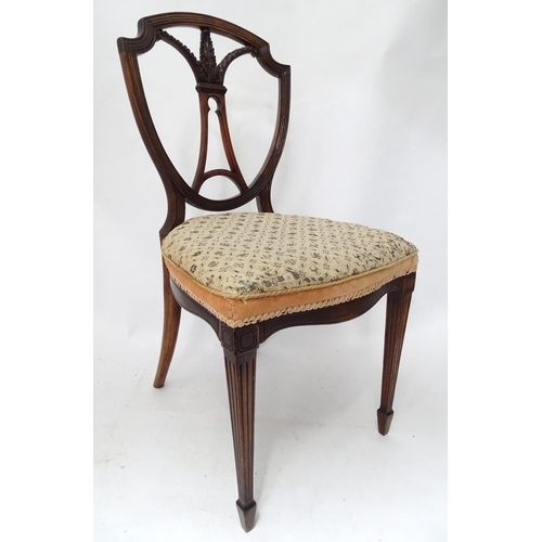 383 - A shield back chair