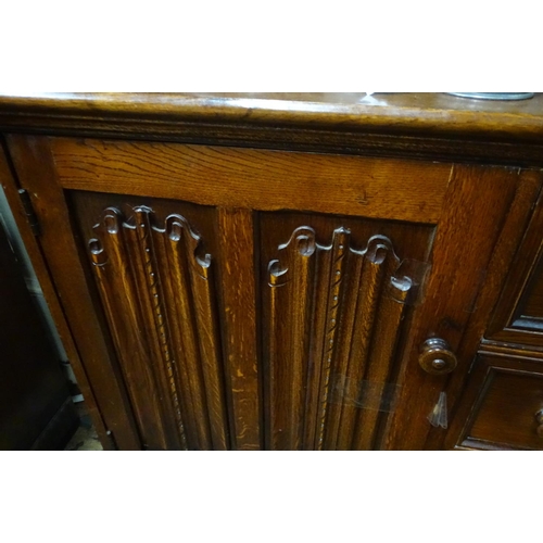 385 - A large oak dresser