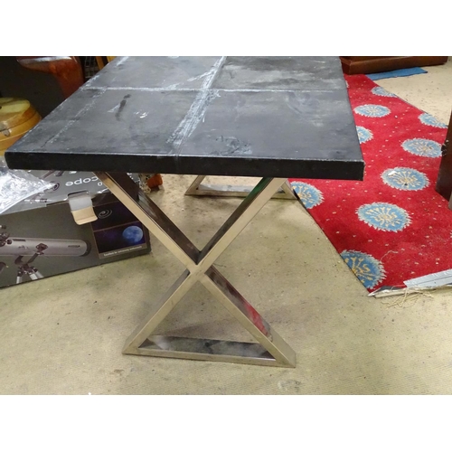 394 - A leather covered occasion table with X-frame chrome trestles