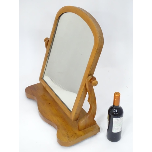 395 - A Victorian mahogany toilet mirror