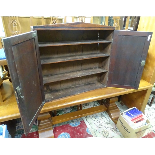 403 - A mahogany wall cupboard