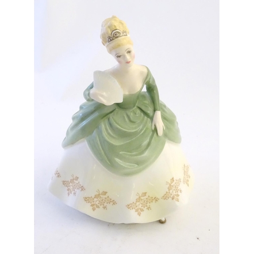 404 - Four Royal Doulton & Co figures of ladies to include Elaine modelled by Peggy Davies (HN2791), Soire... 