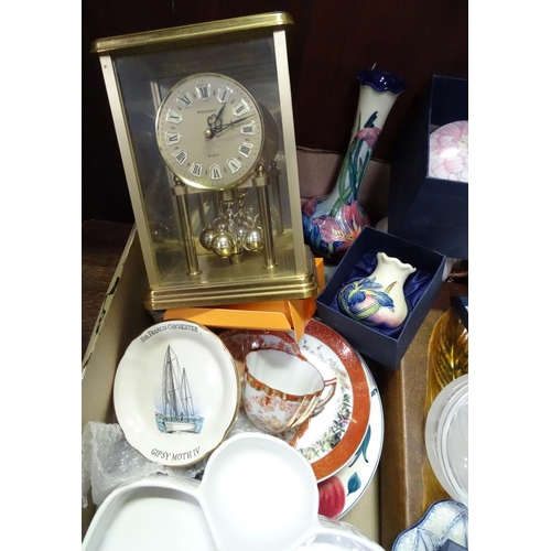 406 - A box of miscellaneous to include a carriage clock, ceramic dressing table pots, cups and saucers et... 