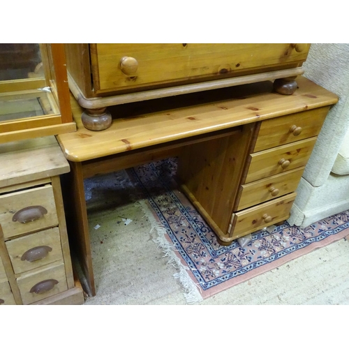 415 - Pine four drawers chest of drawers together with a pine desk (2)