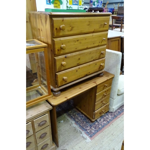 415 - Pine four drawers chest of drawers together with a pine desk (2)