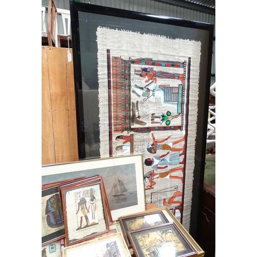 424 - A framed papyrus, together with other artworks