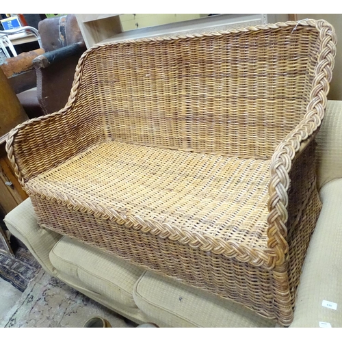 428 - A wicker settee